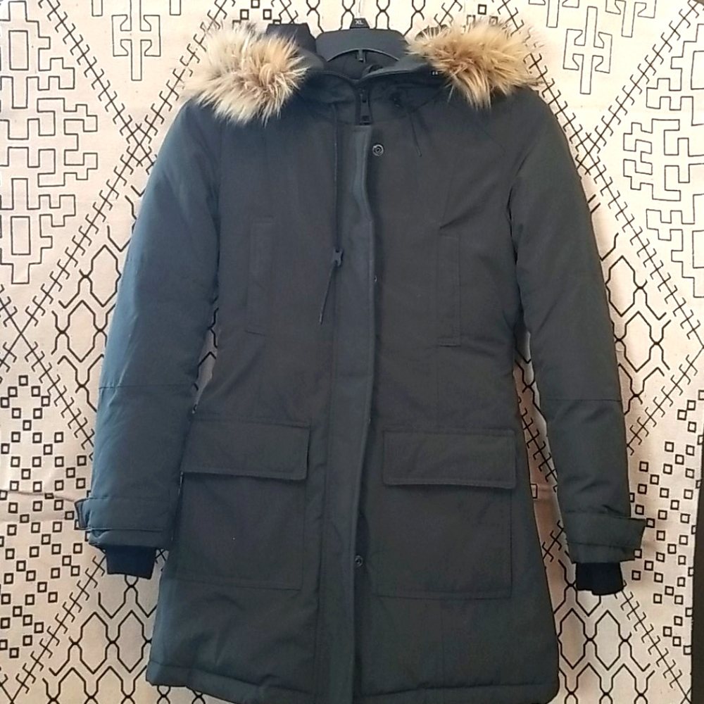 A dark green dex outerwear jacket with